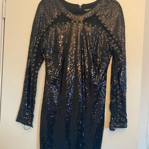 Super cute black sequin dress. In great condition. Hugs curves.